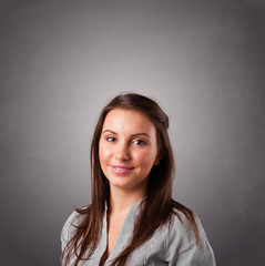 Fototapeta premium Young woman standing and thinking with copy space