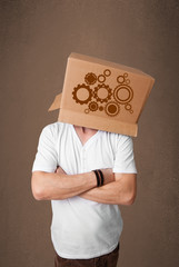 Young man gesturing with a cardboard box on his head with spur w