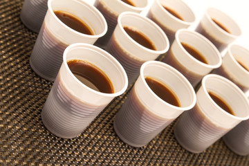 Disposable cups with coffee