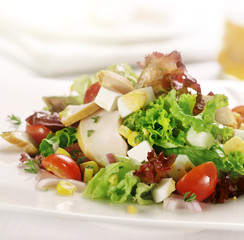 Grilled chicken salad with tomatoes egg and sweet corn