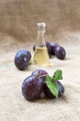 Plum brandy or schnapps and tasty plum fruit.