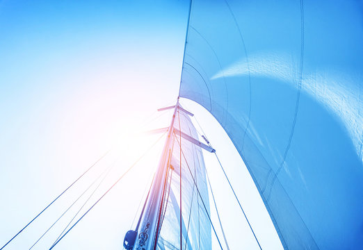 Fototapeta Sail on blue sky background