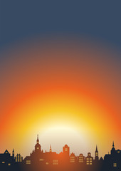 Eine Altstadtkulisse im Sonnenuntergang – Hochformat