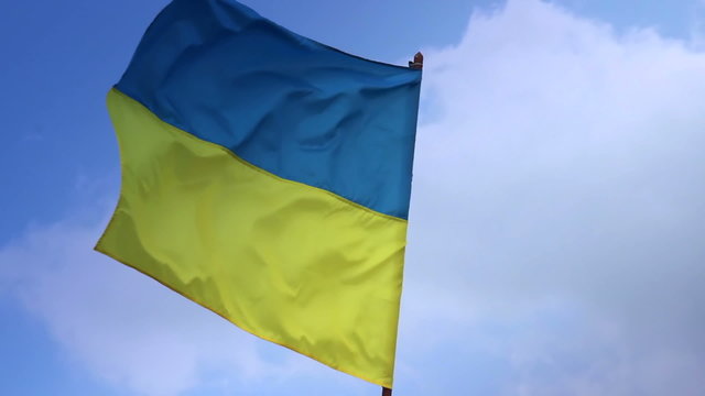 Flag of Ukraine on flagstaff. Ukrainian national flag.