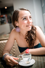 young beautiful woman drinking coffee