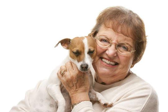 Happy Senior Woman with Puppy.