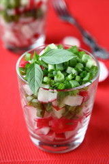 salad with fresh radishes in a glass
