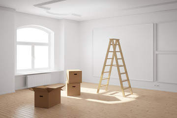 Empty room with ladder and boxes