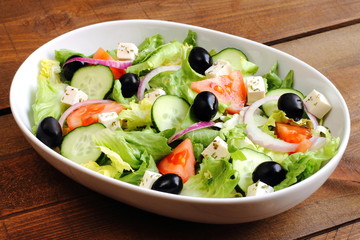 Greek salad with tomato, cucumber, onion, cheese and olives