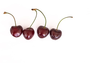 Cherries on white background