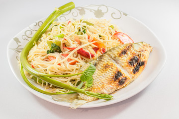 spicy thai food with grilled fish