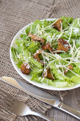 salad with mushrooms (chanterelles), parmesan, lettuce