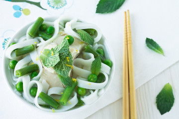 Chicken and peas laksa with mint leaves