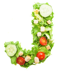 J letter made with salad isolated on white