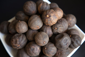 Black dried Lime or Lemon. Spice used in Middle Eastern dishes