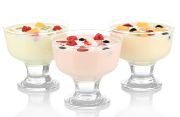 Delicious yogurt with fruit isolated on white