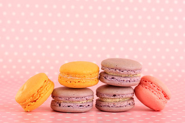 Gentle macaroons on pink background