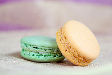Macaroons on fabric background