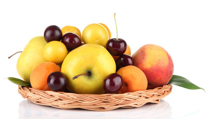 Naklejka na ściany i meble Bright summer fruits in basket isolated on white