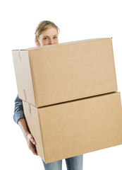 Woman Carrying Stacked Cardboard Boxes