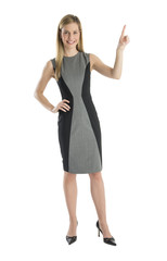 Fototapeta premium Businesswoman With Hand On Hip Pointing Upwards