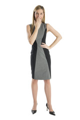Fototapeta premium Surprised Businesswoman With Hand Covering Mouth
