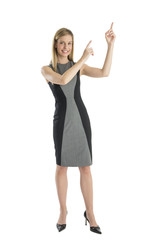 Obraz na płótnie Canvas Businesswoman Pointing Upwards Against White Background