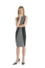 Fototapeta premium Businesswoman With Hand On Chin Looking Away