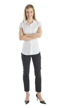 Young Businesswoman Smiling While Standing Arms Crossed