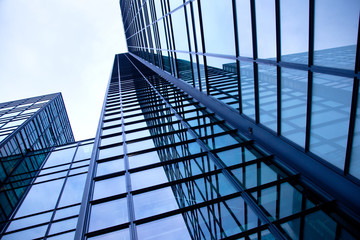 Fototapeta na wymiar modern blue building of glass and steel