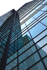 Fototapeta na wymiar blue building with glass facade