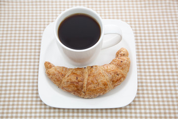 Croissant and a cup of coffee