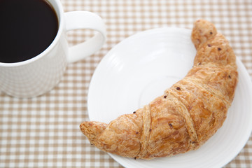 Croissant and a cup of coffee