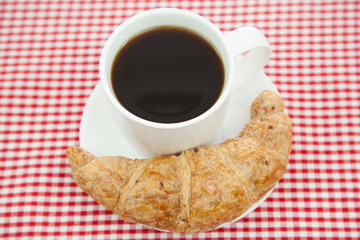 Croissant and a cup of coffee