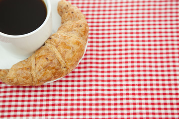 Croissant and a cup of coffee