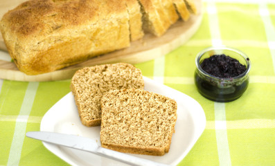 Two Slice of bread with blackberry jam