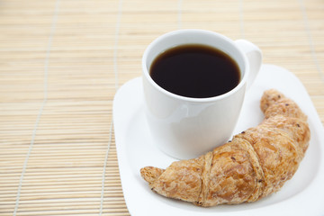 Croissant and a cup of coffee