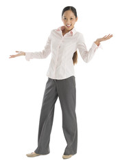 Happy Businesswoman With Arms Outstretched Gesturing