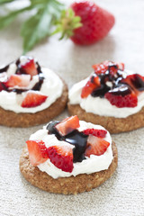 Strawberries with whipped cream and cholocate