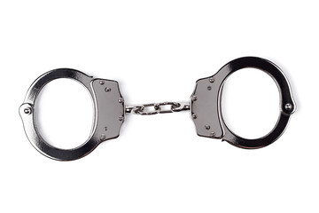 steel handcuffs isolated on the white