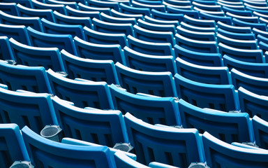 Fototapeta premium row of blue chairs in a stadium