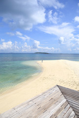 Fototapeta premium Wooden jetty on tropical beach on island