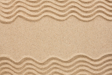 Fototapeta na wymiar wavy lines in the sand