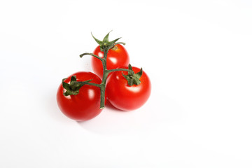 three small tomatoes