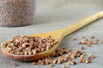 wooden spoon with buckwheat