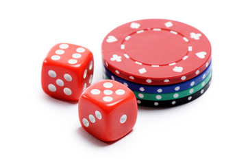 Poker chip and red cubes isolated on white background