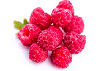 Ripe raspberries isolated on a white