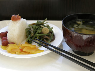 Japanese breakfast : miso soup, rice, beans and pickles