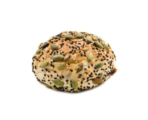 Bread with mixed seeds isolated on white