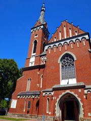 Fototapeta na wymiar Church of St. Adalbert in Wawolnica near the famous chapel of th